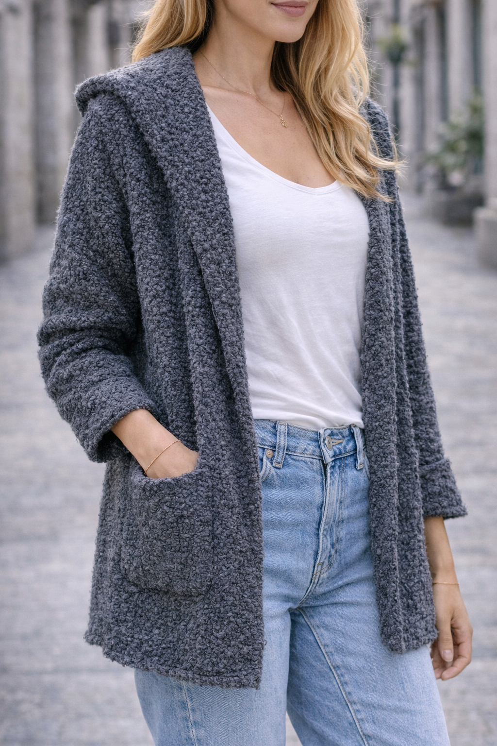 Grey Fengo jacket - mid-length with loops, hood, and long sleeves.